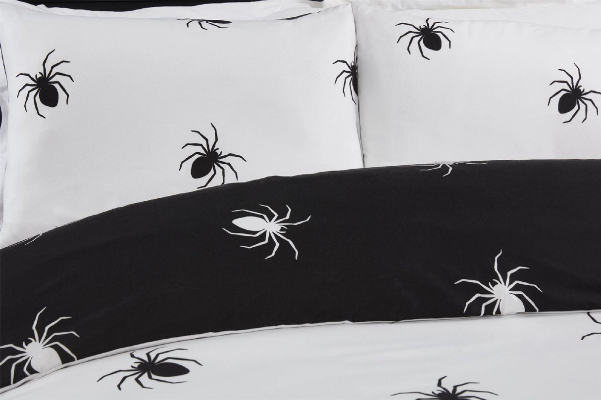 Gothic Halloween bedding featuring a striking black and white spider design, fully reversible and easy to care for in a single, double, or king size with matching pillowcases