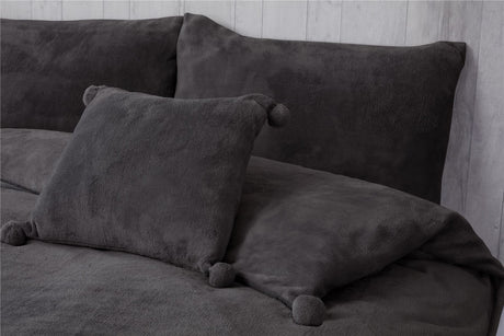 Luxurious Pom Pom Fleece Duvet Set featuring soft, plush fabric with decorative pom pom accents for cozy bedroom decor
