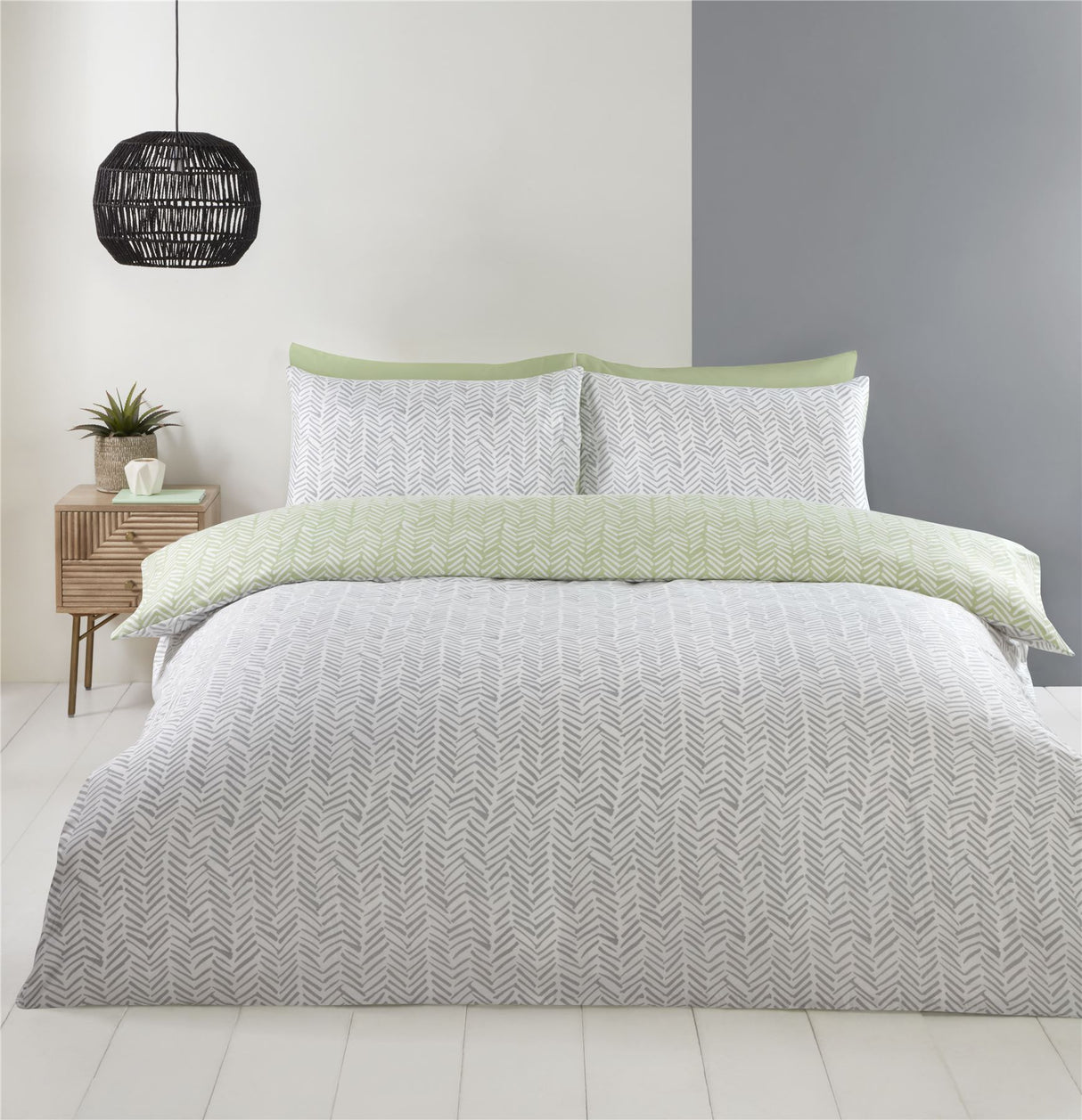 Close-up of the Helston Duvet Set's printed all-over mark making herringbone design on microfibre fabric