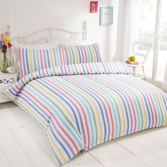 A close-up image of the Candy Stripe Brushed Cotton Duvet Set featuring bright pastel colours, button closure, and matching pillowcases, showcasing the soft 100% brushed cotton fabric perfect for cosy winter nights