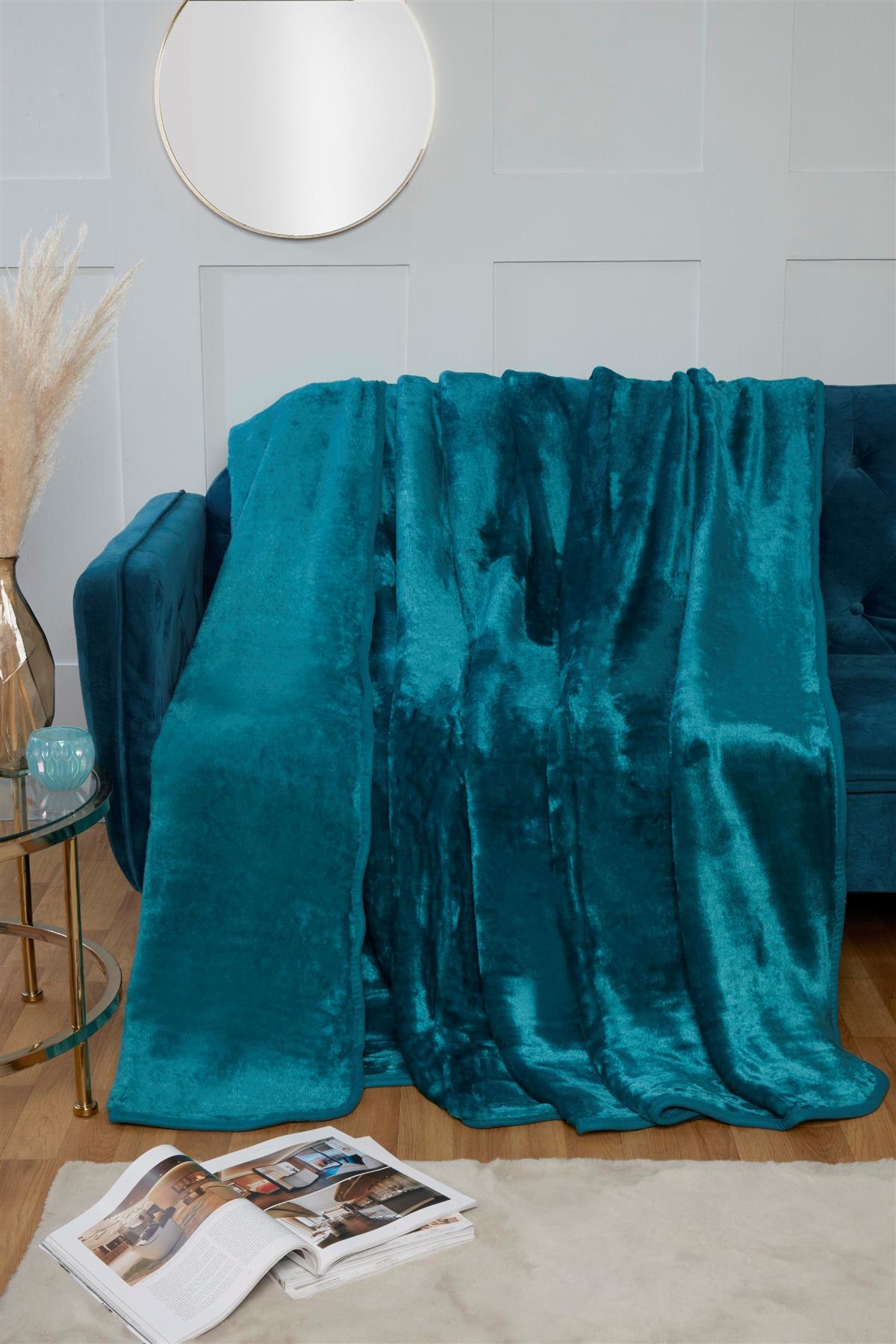 Luxurious dyed mink throw blanket featuring soft, plush fur in vibrant colors for cozy comfort and elegant decor