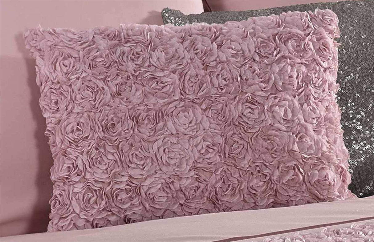 Detailed view of the stunning ruffle embellishment on the Limoges Filled Cushion, complementing the rose floral pattern