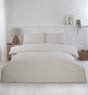 Reversible Gingham Check Duvet Cover with white and checkered design shown on a neatly made bed