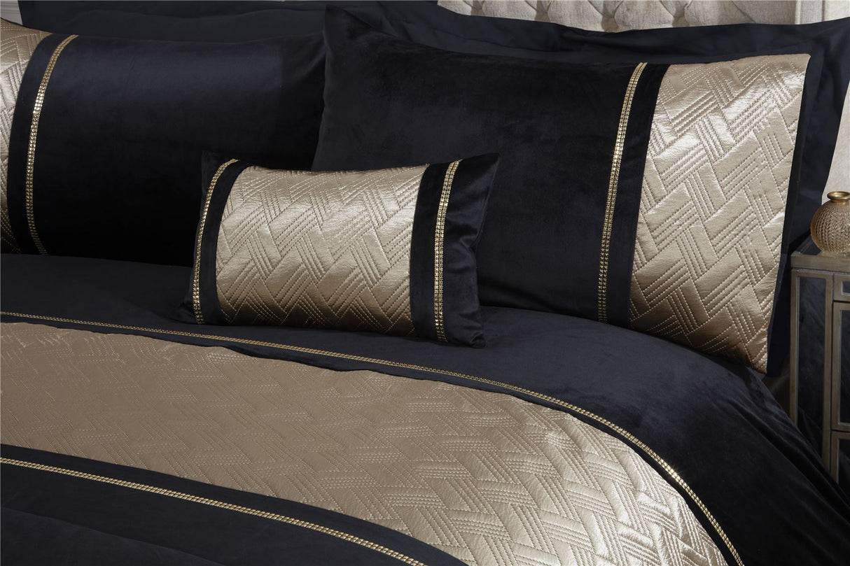 Matching black velvet pillowcases with gold sparkle trim and geometric design for Capri duvet set