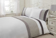 Add a close-up of the Anise Duvet Set showcasing the star quilted banded top cuff design with luxurious satin pintucks