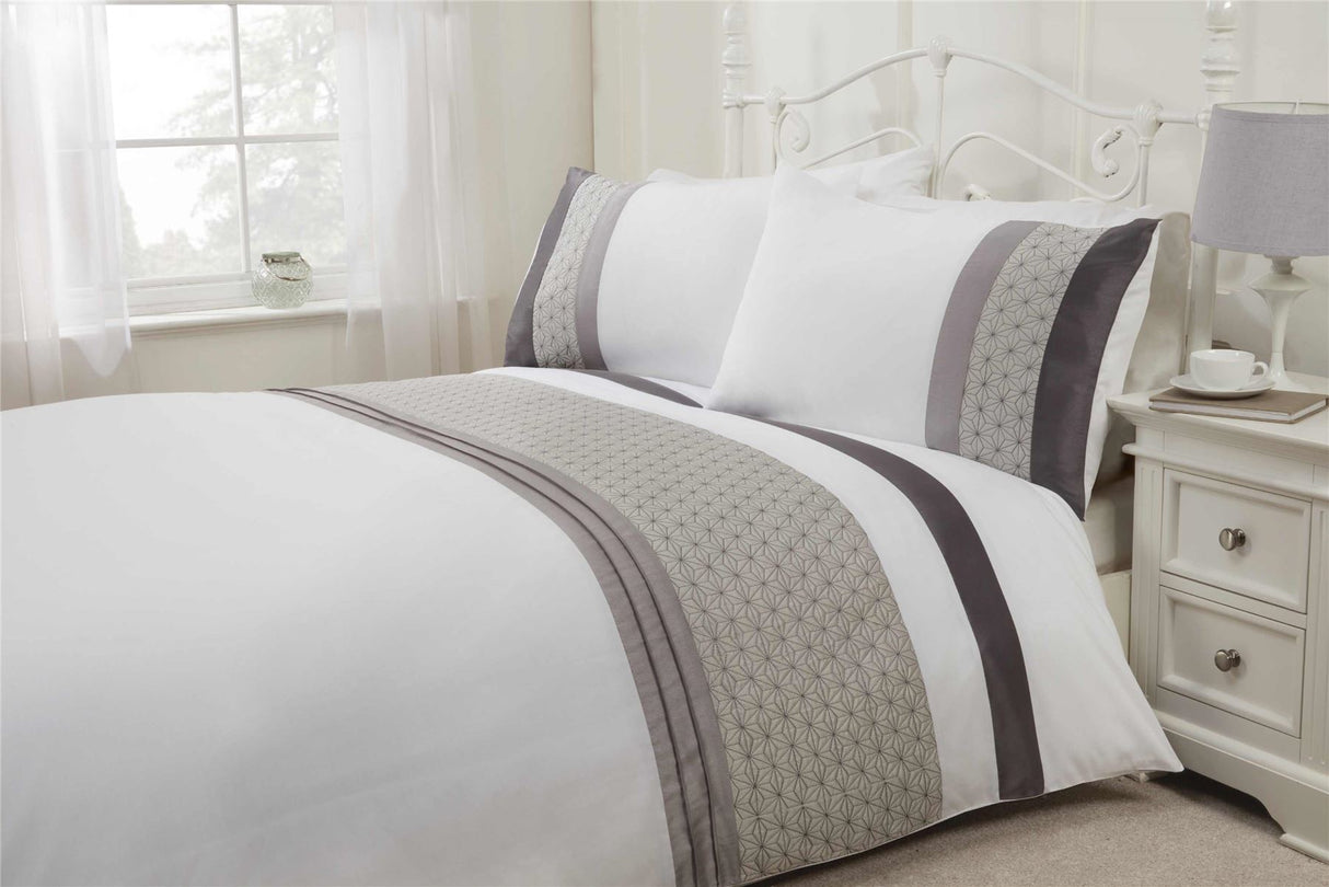 Add a close-up of the Anise Duvet Set showcasing the star quilted banded top cuff design with luxurious satin pintucks