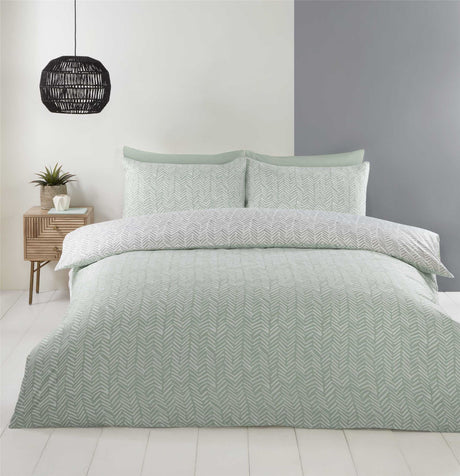 A bedroom scene showing the Helston Duvet Set styled with complementary bedding and modern decor