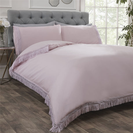 Elegant plain Tia Trellis duvet cover with contrasting lace fringe trim on the duvet and pillowcases