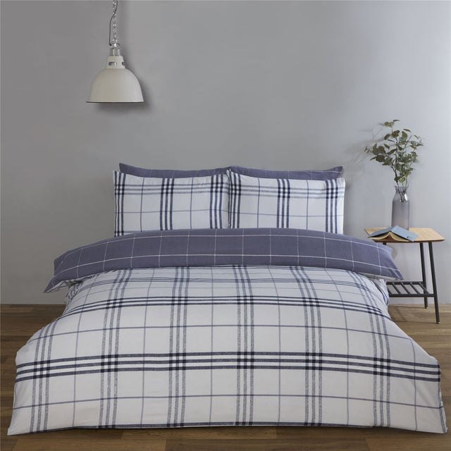 Luxurious Harris Check Duvet Set featuring a classic blue check pattern and contrasting reverse