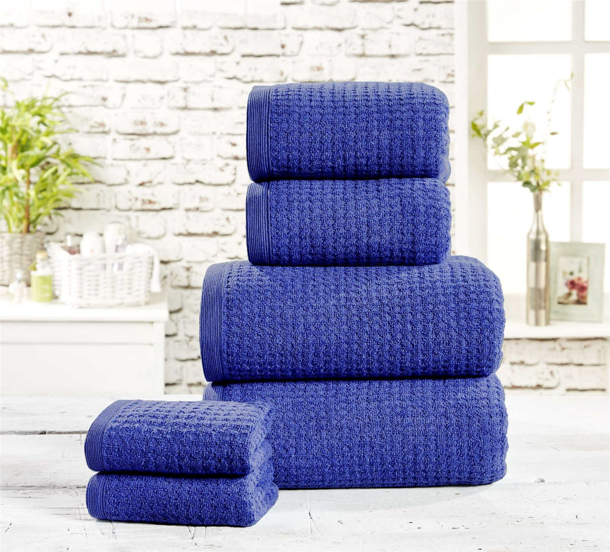 Display of a 2-piece bale including two large waffle bath sheets in a modern textured style