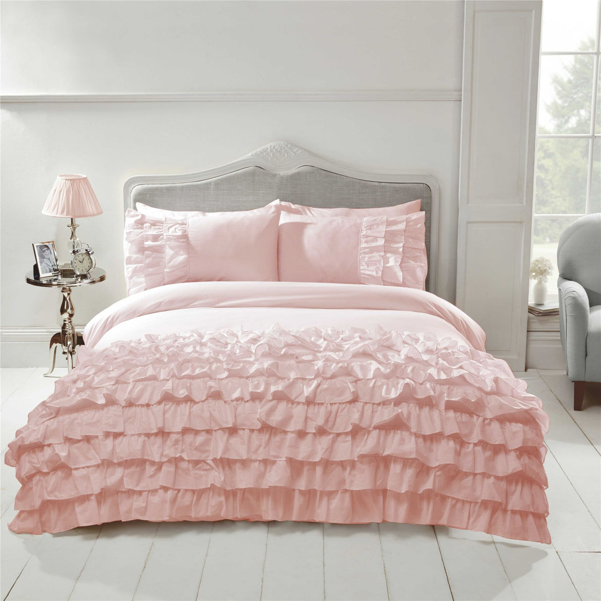 Matching pillowcases with ruffle accents for a feminine boudoir bedroom look