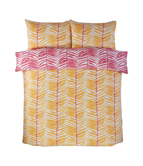 Soft and comfortable Tropical Trails Duvet Set showcasing exotic palm leaf patterns in vivid yellow and pink on a crisp white backdrop