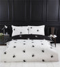 Luxurious black and white spider-inspired reversible duvet set with easycare fabric