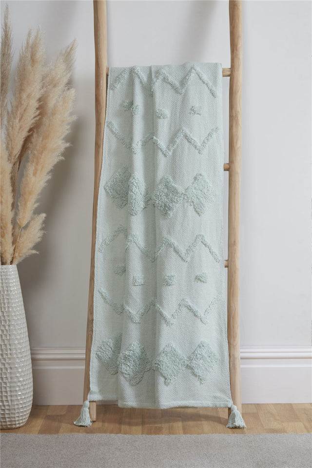 Soft and cozy Juniper Tufted Throw with intricate tufted design