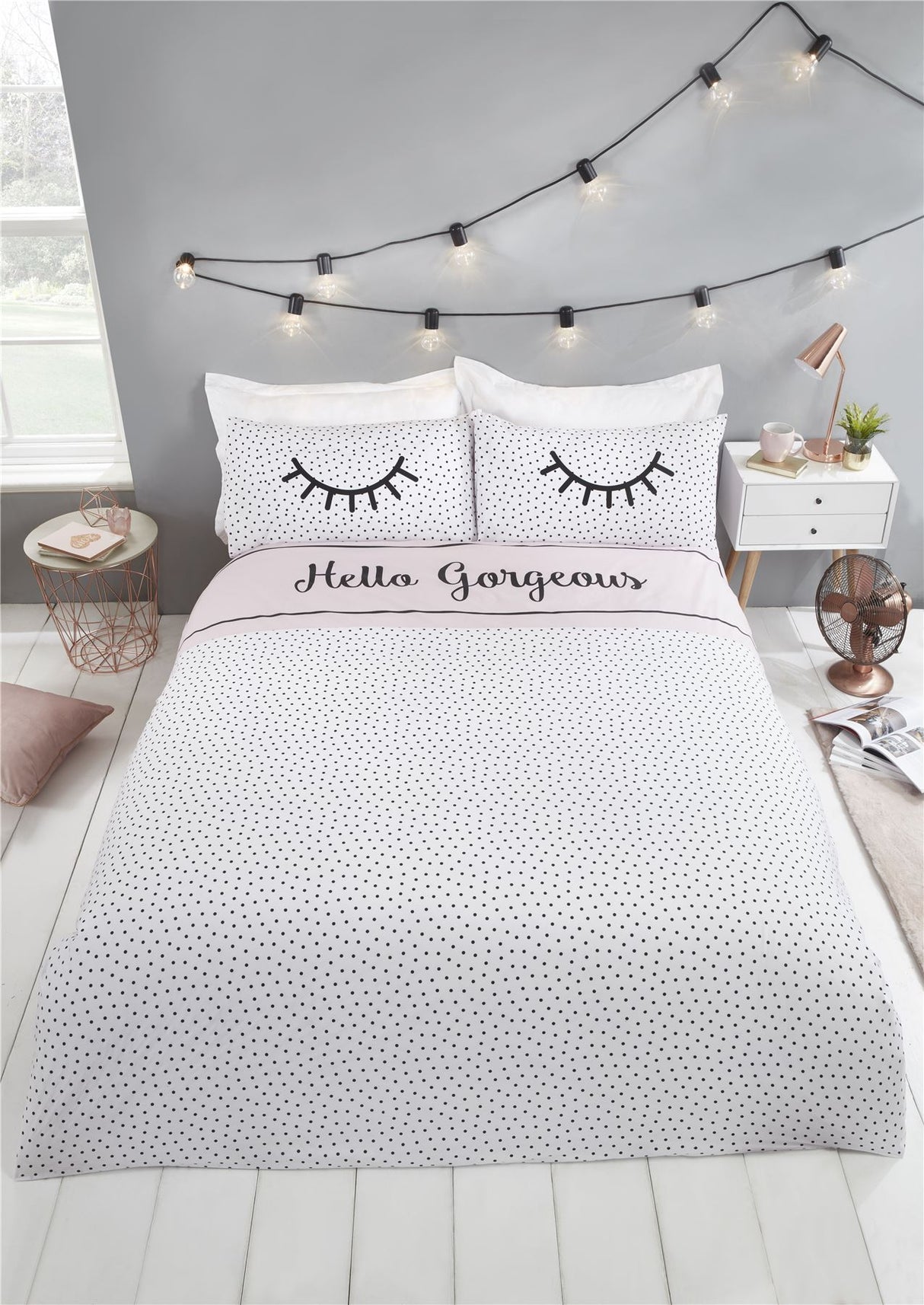 Brightly coloured duvet cover with eyelash and polka dot print, fully reversible design