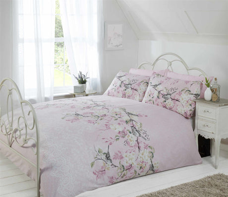 Elegant bedding with delicate floral and bird motif, includes matching pillowcases and popper closure