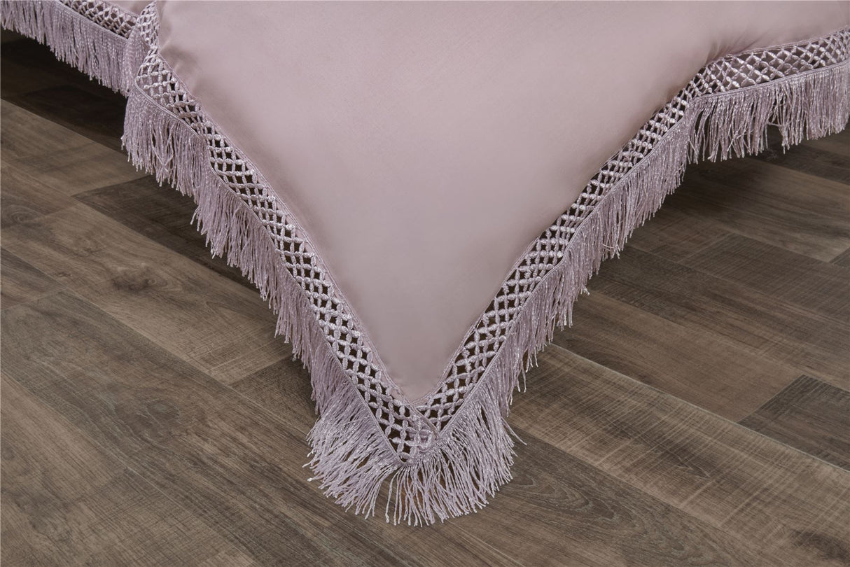 Superking size Tia Trellis duvet cover featuring elegant plain fabric with lace fringe trim and button closure