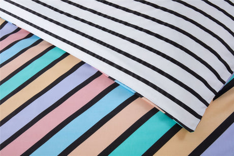 Elegant bedding ensemble with playful striped design, perfect for creating a cosy and inviting space