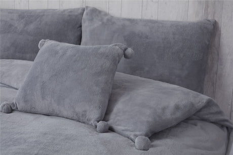 Luxurious Pom Pom Fleece Duvet Set featuring plush, cozy fabric with decorative pom pom accents for a stylish and comfortable bedroom look