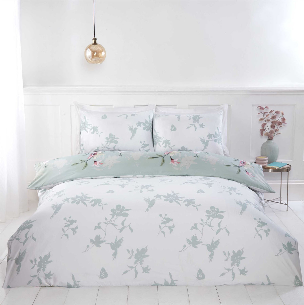 Elegant floral and hummingbird design on soft, high-quality fabric duvet cover with matching pillowcases