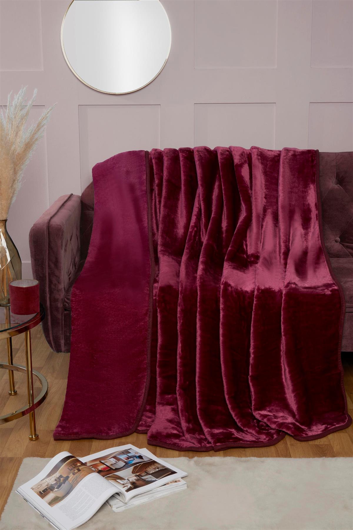 Luxurious dyed mink throw blanket featuring soft, plush fur in vibrant color for cozy comfort