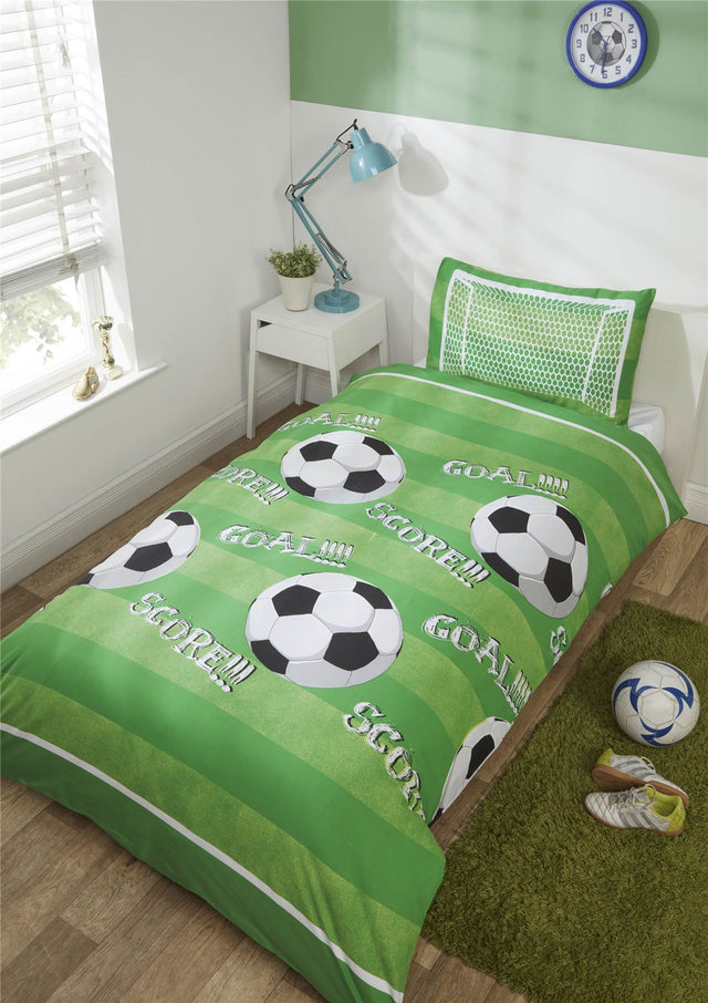 A football-themed duvet cover set featuring footballs, the words 'score' and 'goal', on a green pitch background with a goal net on the pillowcase