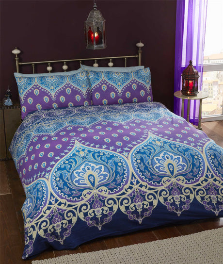 A double-sized Asha Duvet Cover with coordinating pillowcases, displaying bright colours and detailed pattern