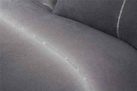 The duvet cover draped over a bed, illustrating its soft teddy fleece fabric and stylish design