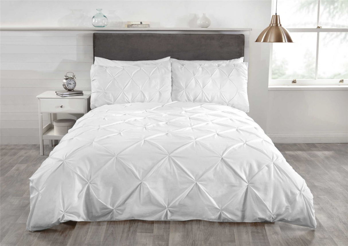 Versatile bedding set showcasing all-over pin-tuck design and button closure