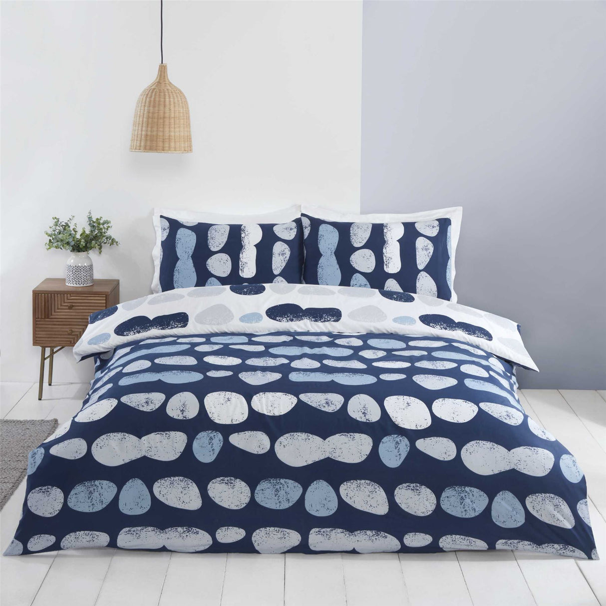 Luxurious Truro Duvet Set featuring pebble effect design in blue and natural colours