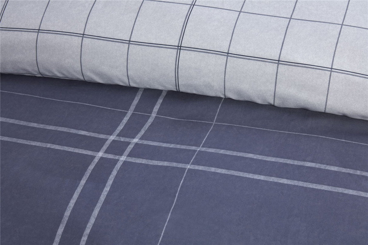 Fully reversible Hudson Bedding Ensemble with easycare fabric, non-iron finish, and convenient popper closing mechanism for comfortable sleep