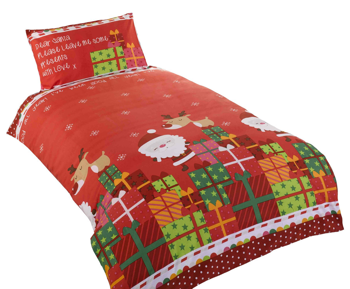 Matching pillowcase with Santa and reindeer design on a red background, included with the Dear Santa Duvet Set for festive bedtime comfort