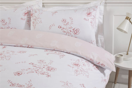 King size Sadie duvet cover with floral front and paisley reverse, accompanied by two pillowcases