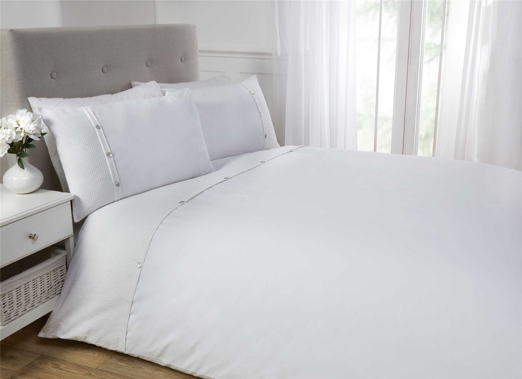 5th Avenue Duvet Set featuring a clean and stylish top cuff waffle design, finished with pearl effect buttons for a touch of sophistication in your bedroom