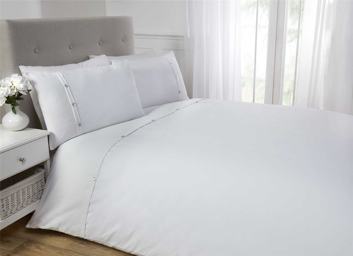 Luxurious 5th Avenue Duvet Set featuring a clean top cuff waffle design with pearl effect buttons for sophisticated bedroom décor