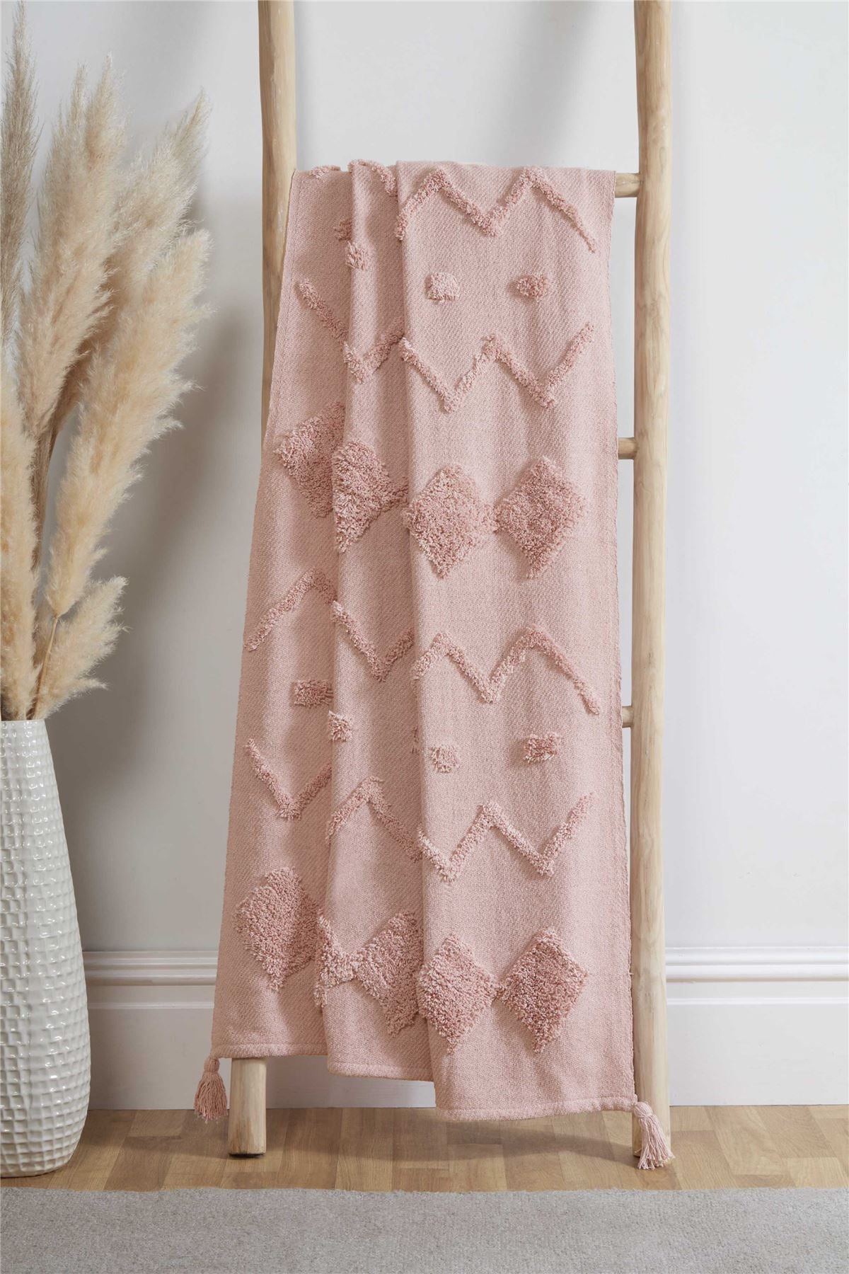 Soft and luxurious Juniper Tufted Throw blanket with intricate tufted detailing