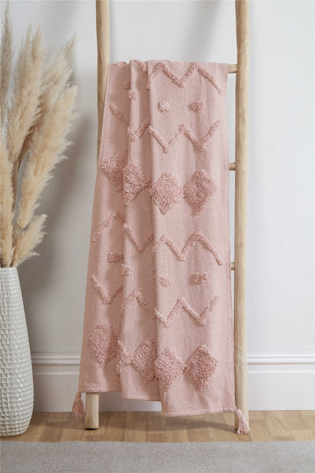 Soft and luxurious Juniper Tufted Throw blanket with intricate tufted detailing