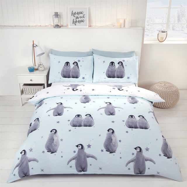 Photographic penguin motifs on a subtle pink background creating a charming bedroom decor