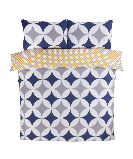 Matching pillowcase with retro geometric pattern and popper closure detail