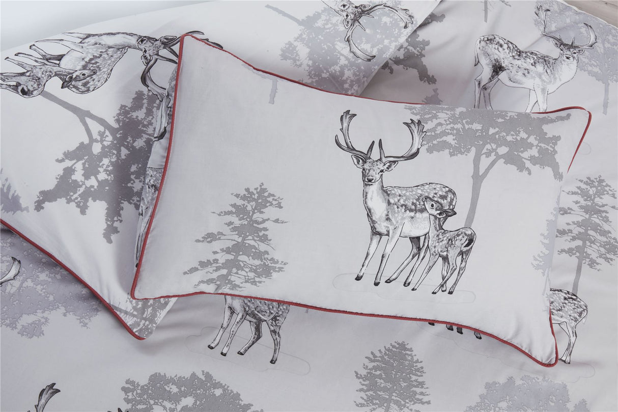 Fully reversible Sherwood Duvet Set with beautiful watercolour woodland motif and striking piping finish