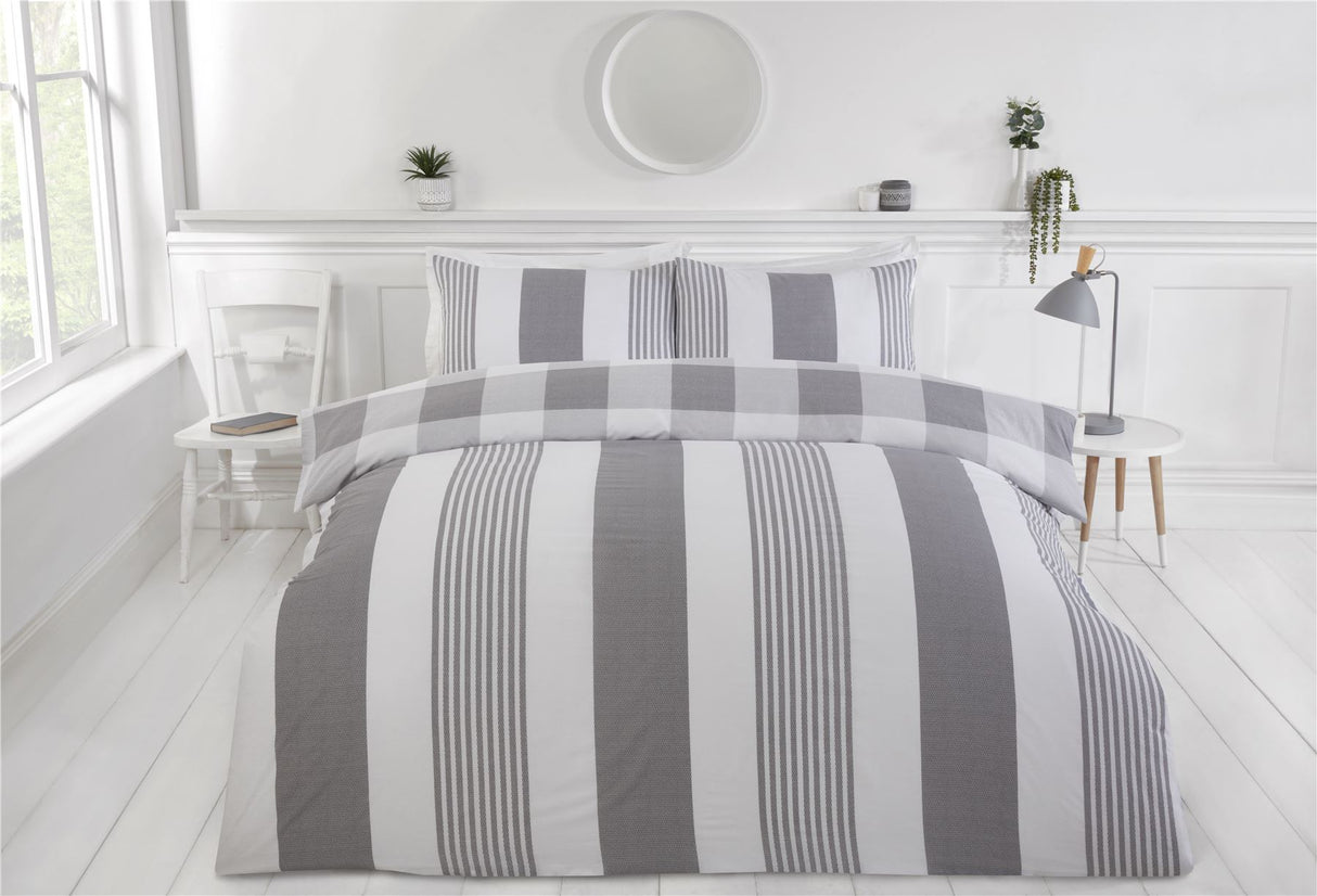Close-up of the fresh and clean chambray stripe design with check reverse for the Happy Home duvet set