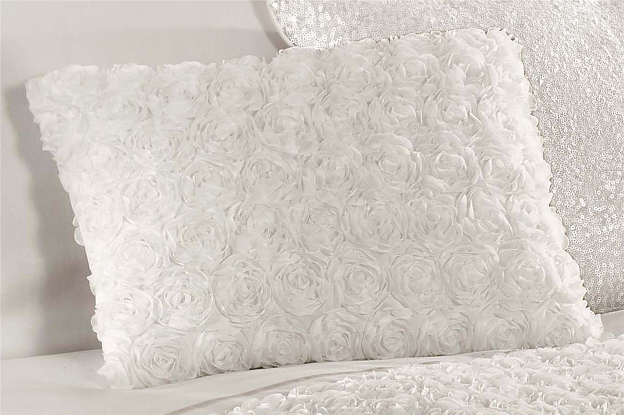 Luxurious Limoges Filled Cushion featuring an intricate rose floral design and chic ruffle detail
