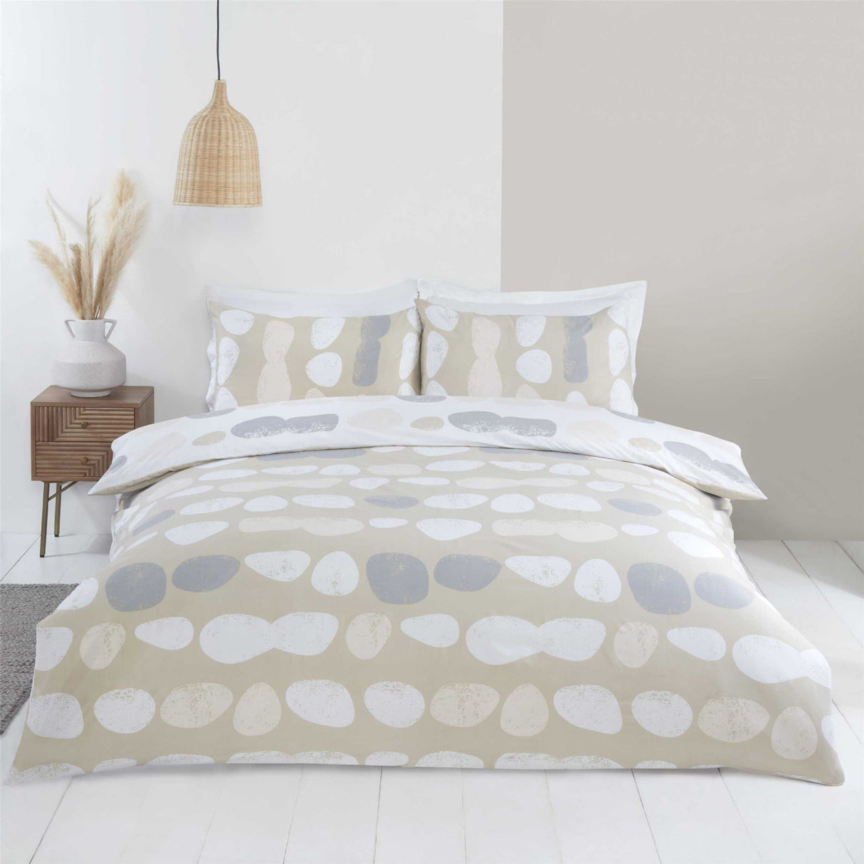 Close-up of Truro Duvet Set showing the all-over pebble print and contrasting reverse for modern bedroom style