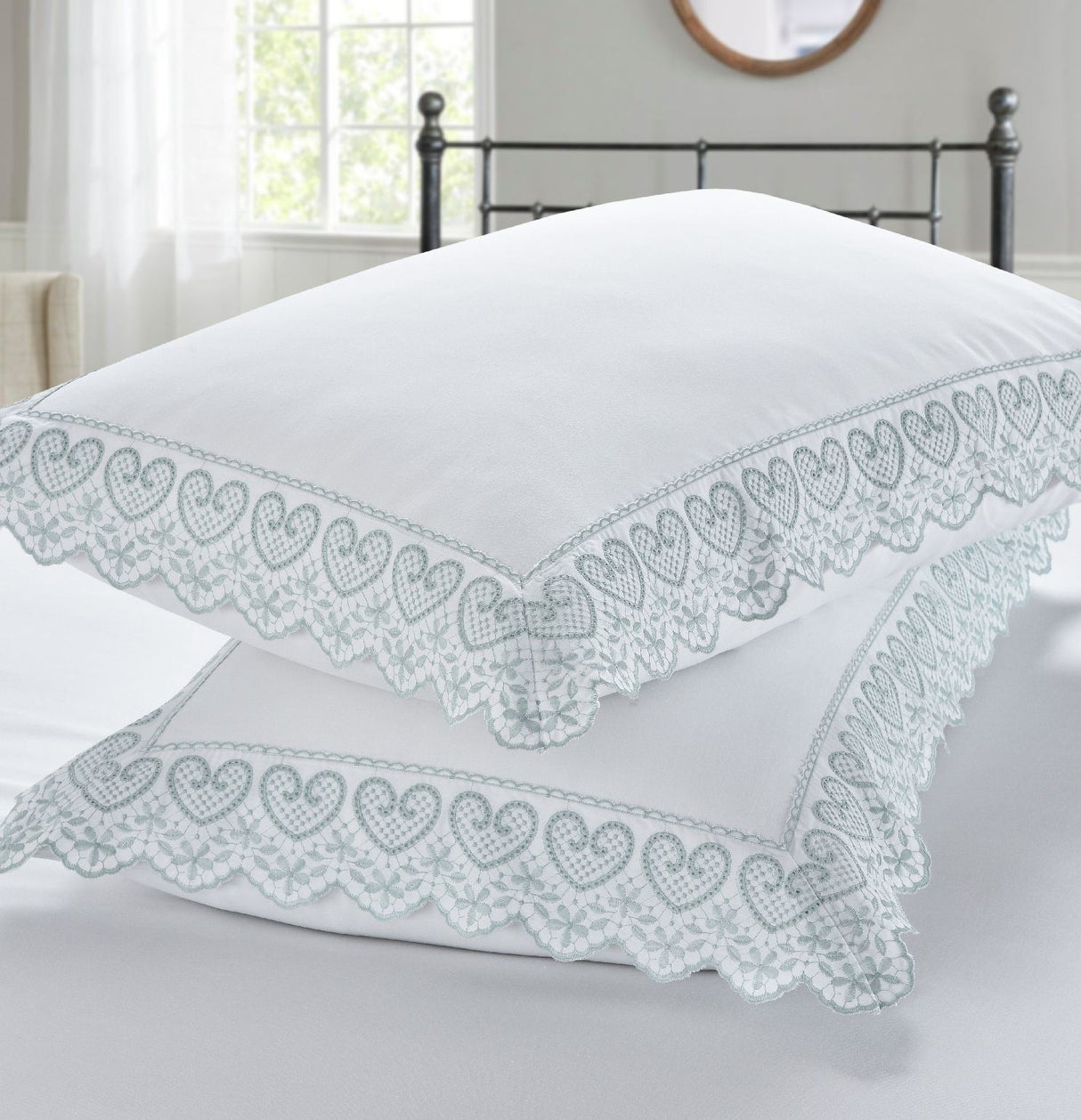 Romantic Elise bedding with beautifully crafted embroidery and lace details creating a luxurious bedroom aesthetic