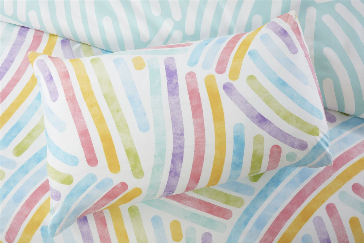 Full view of the reversible Art Duvet Set featuring contrasting aqua and white reverse, perfect for a cosy, easy-care bedroom aesthetic