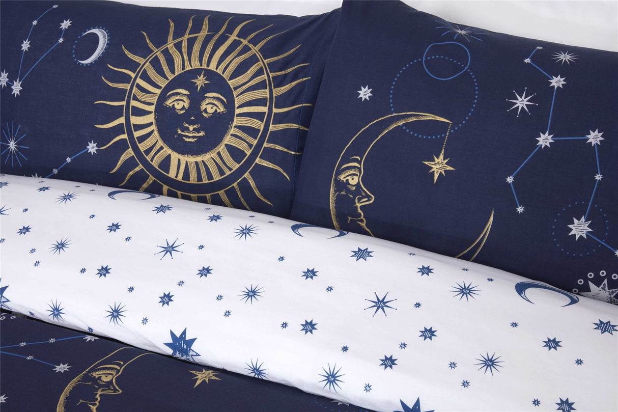 Luxury celestial duvet set with metallic celestial designs and contrasting ditsy star pattern, includes matching pillowcases