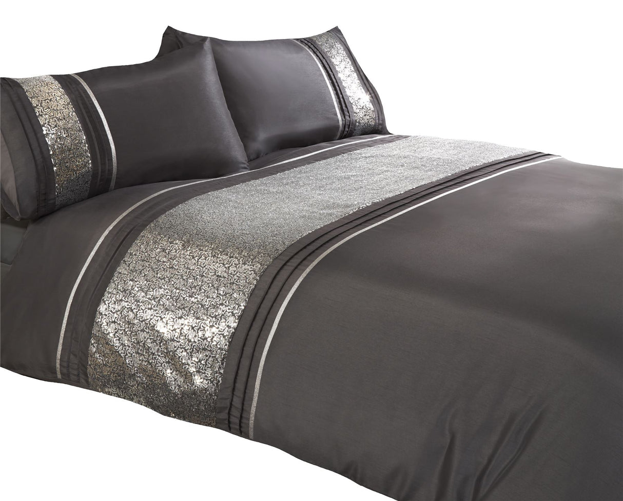 Elegant Ritz Duvet Set with detailed silver sequined design on head and matching pillowcases with button closure
