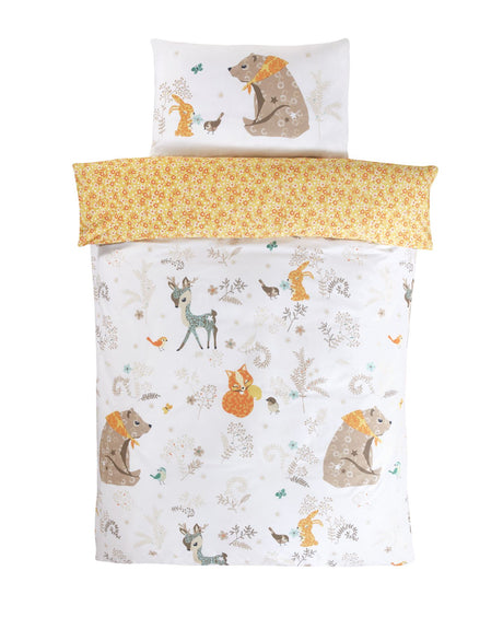 Reversible Woodland Friends duvet set featuring adorable animals and foliage in calming hues, designed by British artists