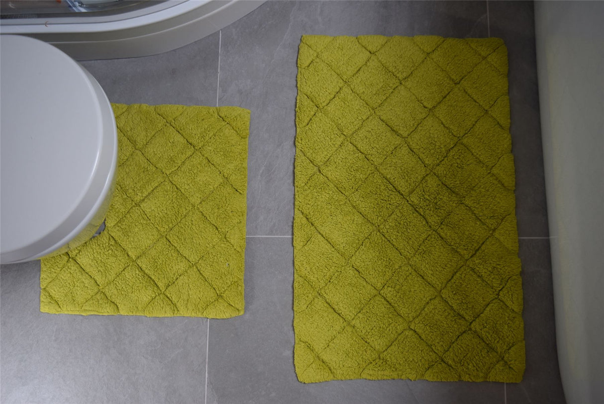 Chic and functional bath mat from the Kyra set, woven for softness and long-lasting use in any bathroom