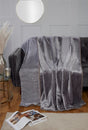 Luxurious dyed mink throw blanket featuring soft, plush fur in vibrant, stylish colors for cozy comfort